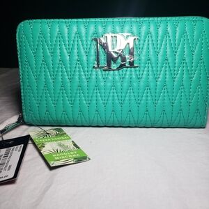Badgley Mischka Long Wallet green in color